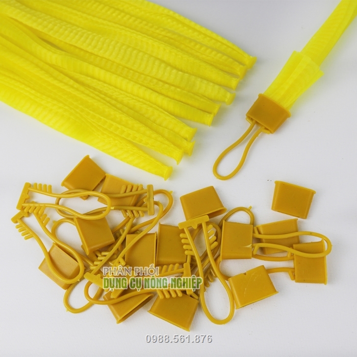 Túi lưới nhựa kèm khóa màu vàng dài 25cm